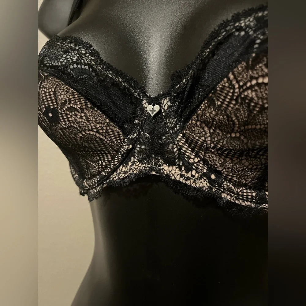 BLACKHEART bra new with partial tags.  Black and nude color. Underwire. 36B
